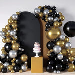 Three black spandex fitted arch covers staged with party decorations for an elegant wedding reception