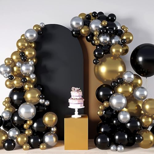 Three black spandex fitted arch covers staged with party decorations for an elegant wedding reception