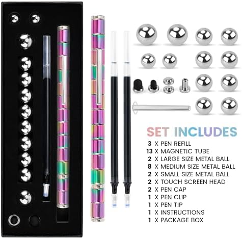 Colorful decompression toy pen disassembled into individual magnetic pieces and metallic balls on a desk