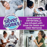 Eco friendly silver technology laundry balls separating clothes in a modern machine