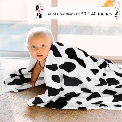 Soft baby blanket and cotton onesie from Iaovueby collection