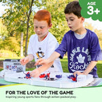 Action figures from the Kaskey Kids hockey set arranged on the plastic ice mat with rink walls.