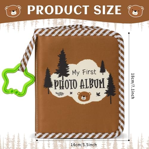 Soft cloth baby memory book opened to show the clear protective photo sleeves holding pictures.