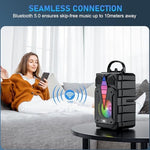 Dnil party speaker with microphone attached demonstrating karaoke setup.