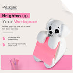 Mia DayKor 3x3 sticky note dispenser placed on office desk setup