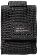 Authentic black crackle windproof lighter standing next to its heavy duty nylon tactical pouch