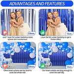 Two pack of Crosize dark blue metallic foil door streamers installed on a party wall