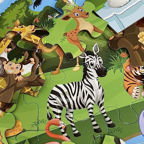 Toddler hands assembling the oversized thirty five piece cardboard floor puzzle layout