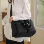 Alusbell black utility tote bag close up texture