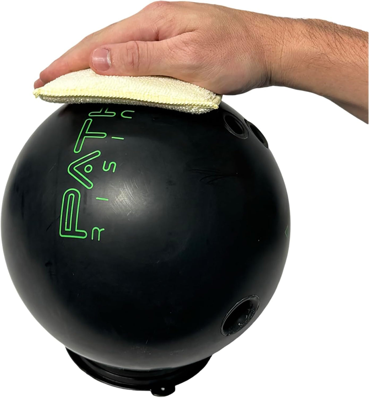 Bowlingball Monster Microfiber Pad held in hand for scale