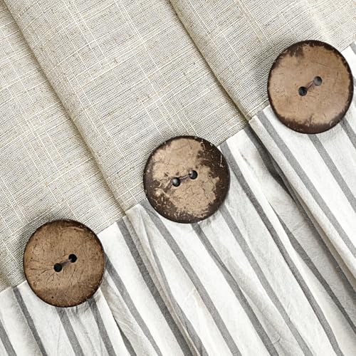 Detailed shot of the antique style wooden button embellishments and elegant fabric pleats.