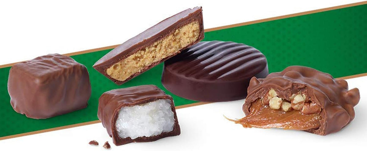 Individually wrapped pieces of sugar free peanut butter cups and pecan delights spread out