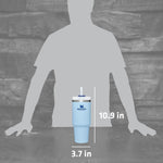 Authentic Stanley imported USA emotional lifestyle hydration tumbler standing on a desk.
