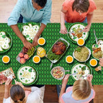 Green buffalo plaid tablecloth and Irish party banner