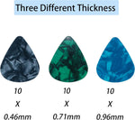 Harpfeas guitar picks showing assorted multicolor abstract designs