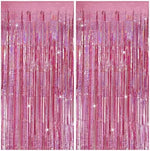 Glitter pink foil fringe curtain streamers installed as a birthday party photo booth background