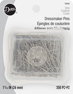 Stackable plastic storage boxes of Dritz garment pins displayed for sewing enthusiasts.