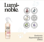 Lumi-Noble pet odor neutralizer bottle in a home grooming setting