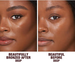 Creamy texture swatch of Charlotte Tilbury face and body bronzer formula