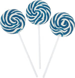 Charming pink and white swirled decorative lollipops positioned as sweet table decorations.
