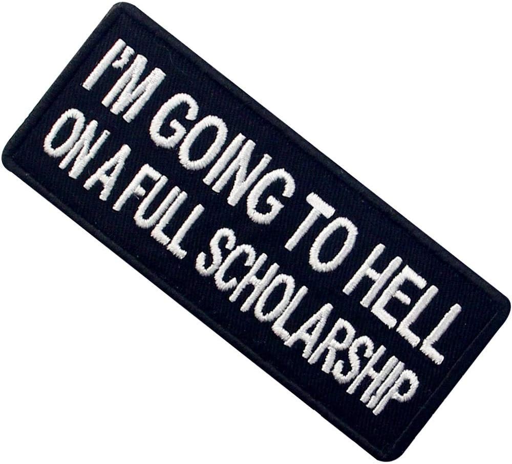EmbTao applique patch displayed on denim fabric