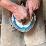 Easy application of the USA imported equine hoof treatment into a horse hoof crevice.