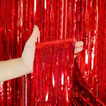 Double sided adhesive tape strip on top of the Melsan red fringe curtain
