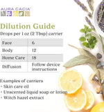 Aura Cacia essential oil bottle with diffuser background
