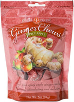 Close up of individually wrapped Gin Gins Spicy Apple chewy ginger candies.