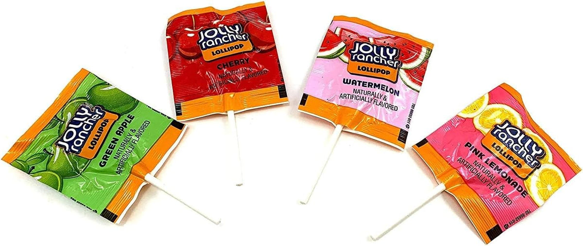Munchique assorted flat lollipops being unboxed for a birthday party display.