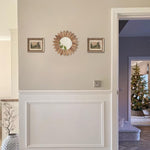 LOSOUR wooden wall mirror shown with included hanging hardware