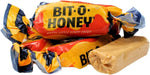 Classic yellow and blue wrapped Bit O Honey candy close up details