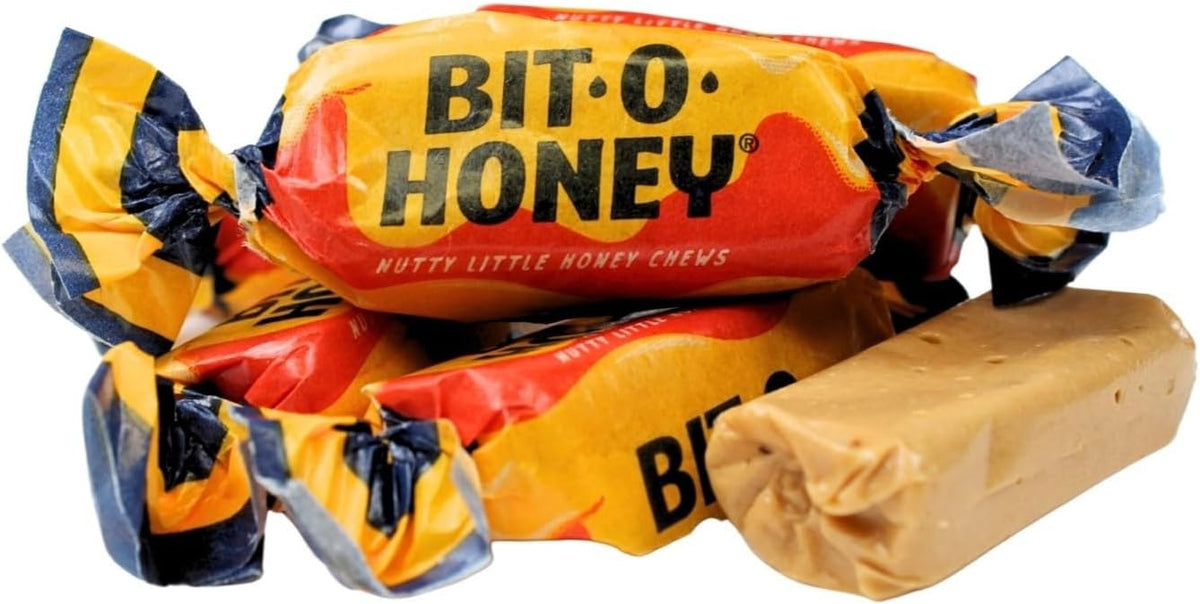 Classic yellow and blue wrapped Bit O Honey candy close up details