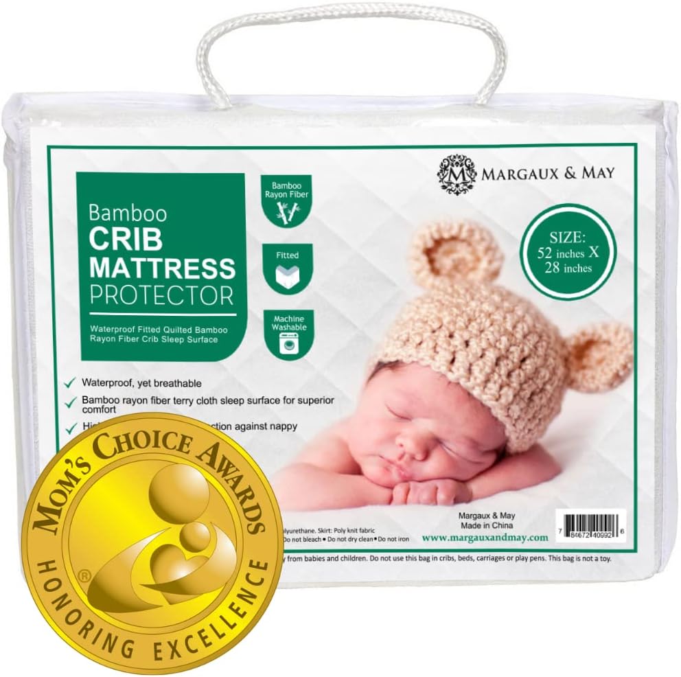 Margaux & May Bamboo Crib Mattress Protector front view showcasing the white quilted surface.