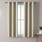 ChrisDowa cappuccino window treatment draped on rod