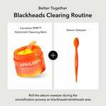 APRILSKIN Carrotene IPMP Hydromelt Cleansing Balm texture close up with included spatula tool.