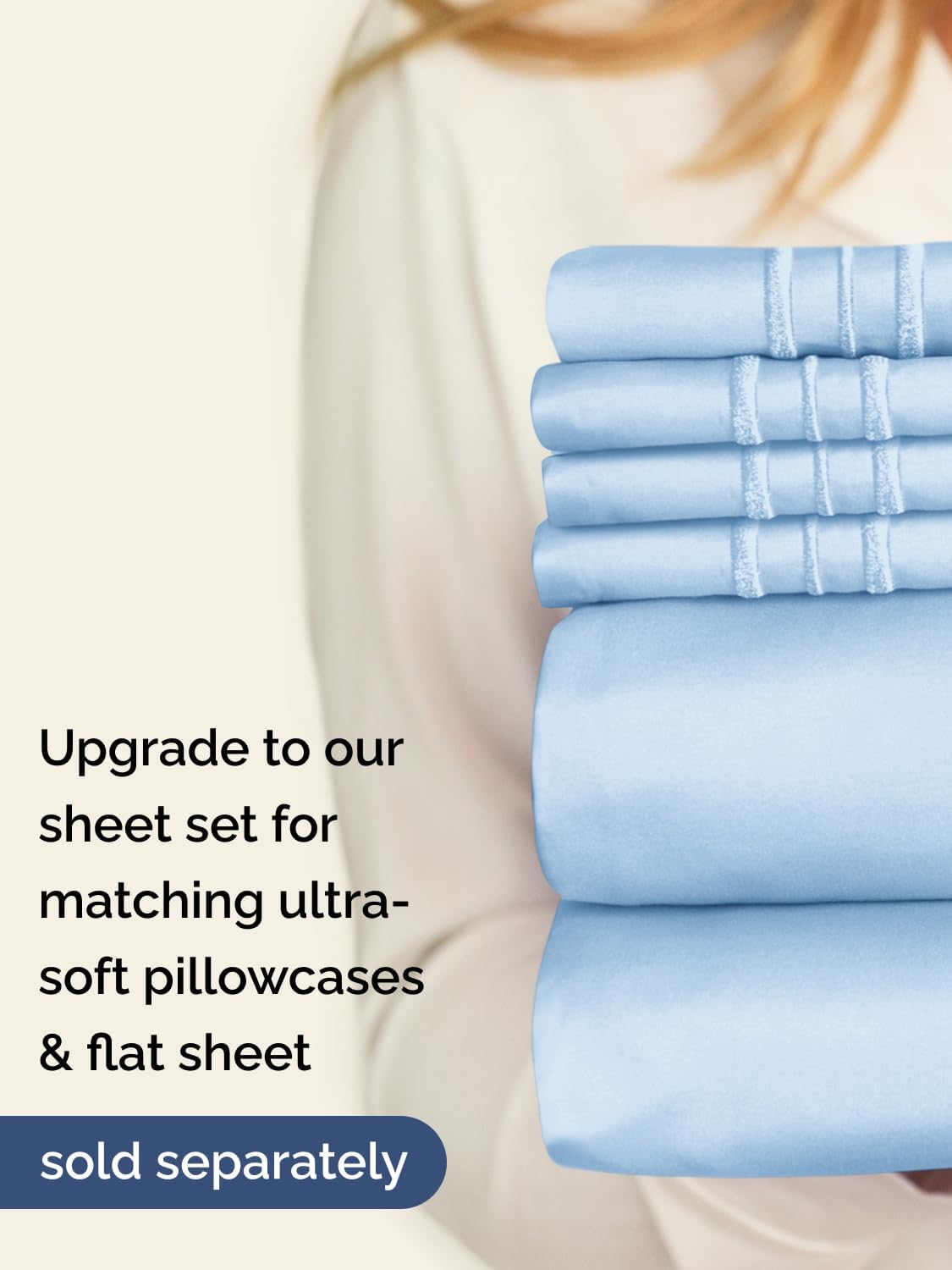 Light blue fitted sheet styled neatly on a California King bed