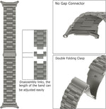 Gray titanium metal strap attached to smartwatch