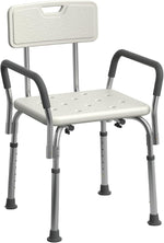 Medline shower chair front view with padded armrests and back
