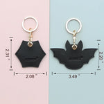Xeewen faux leather AirTag case displaying the spider shape.