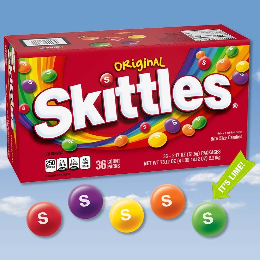 Skittles Original bite-size fruit candies scattered out of packaging