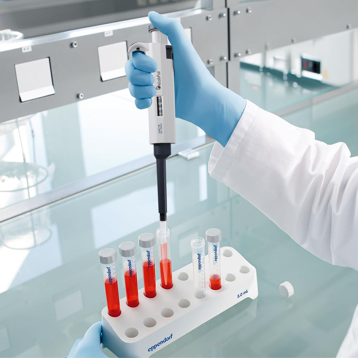 eLabPal laboratory liquid transfer pipette tip ejector button close up