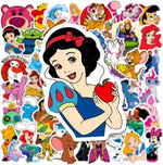 Decorative cartoon character decals on a skateboard surface