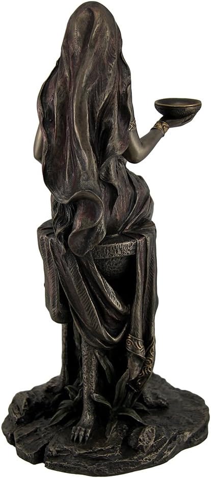 Veronese Design Pythia statue displayed on a shelf