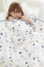 Folded unisex infant crib blanket showing border trim