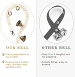 Klogtsind dog bell hanging on indoor door
