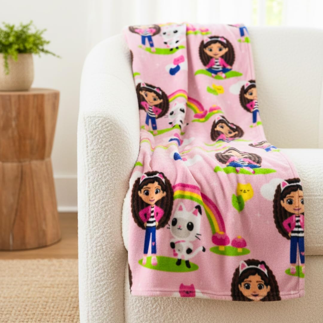 Franco Gabby's Dollhouse kids bedding silk touch throw blanket front view featuring vibrant pink character patterns.