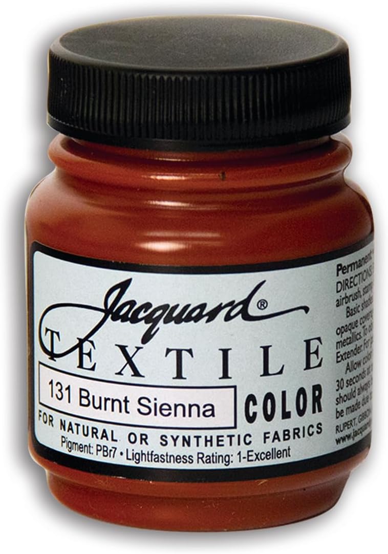Jacquard 2.25 fluid ounce orange fabric paint label close up