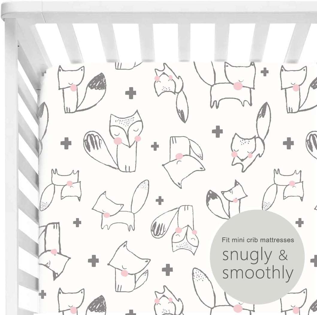 Close-up of 4-way stretch fabric texture on portable crib sheets
