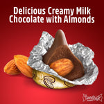 Close up of gold wrapped chocolate kisses with almond center